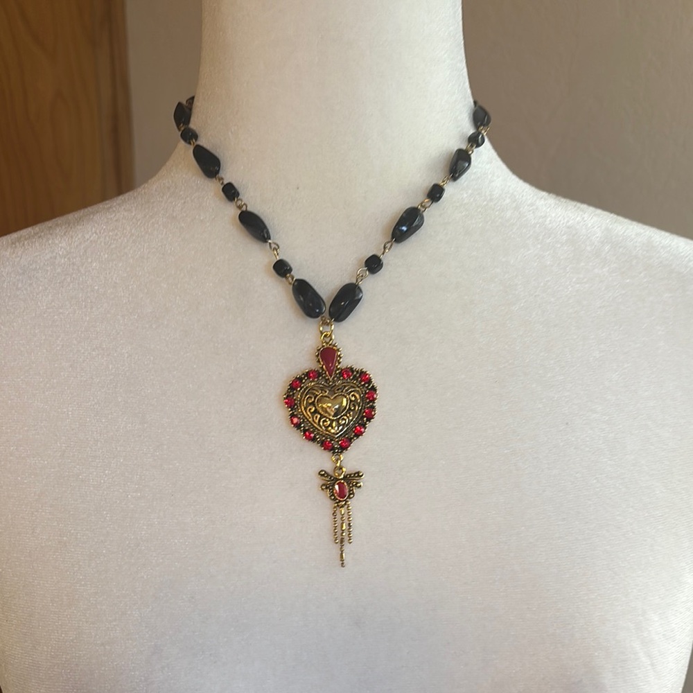 Elegant Gold and Black Heart Pendant Necklace